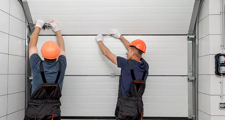 Garage Door Bottom Panel Repair in Ocoee, FL